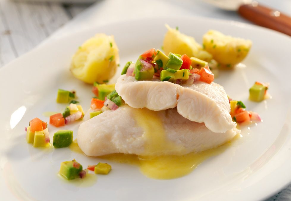 Poached fish with avocado salsa