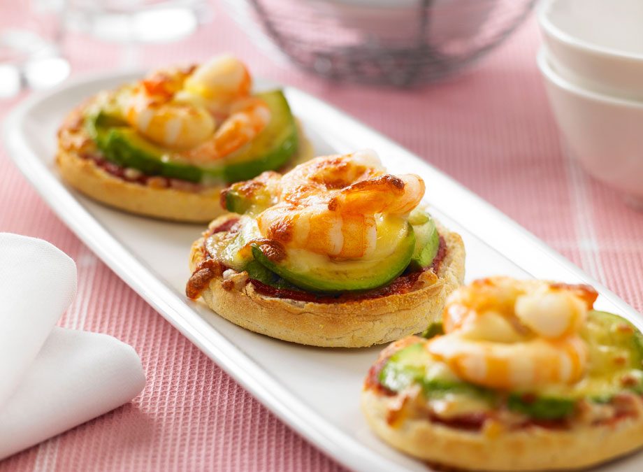 Mini prawn and avocado muffin pizzas