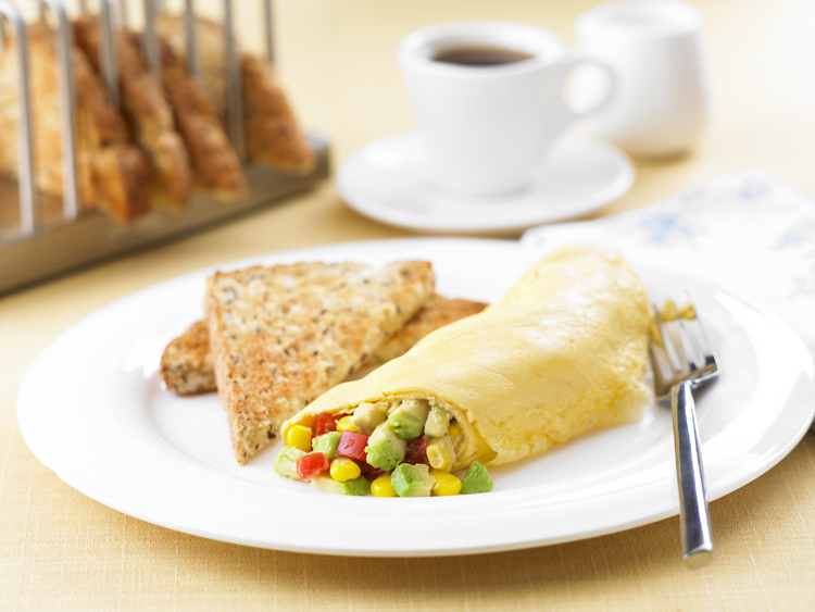 Avocado, corn and tomato omelette