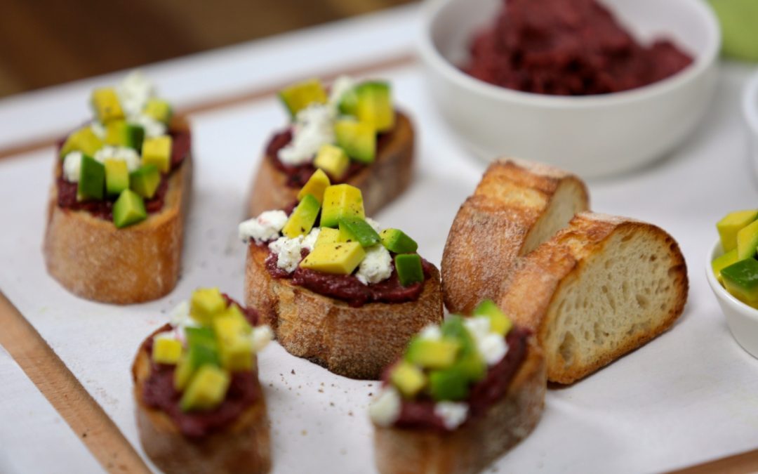 Pink avocado bruschetta