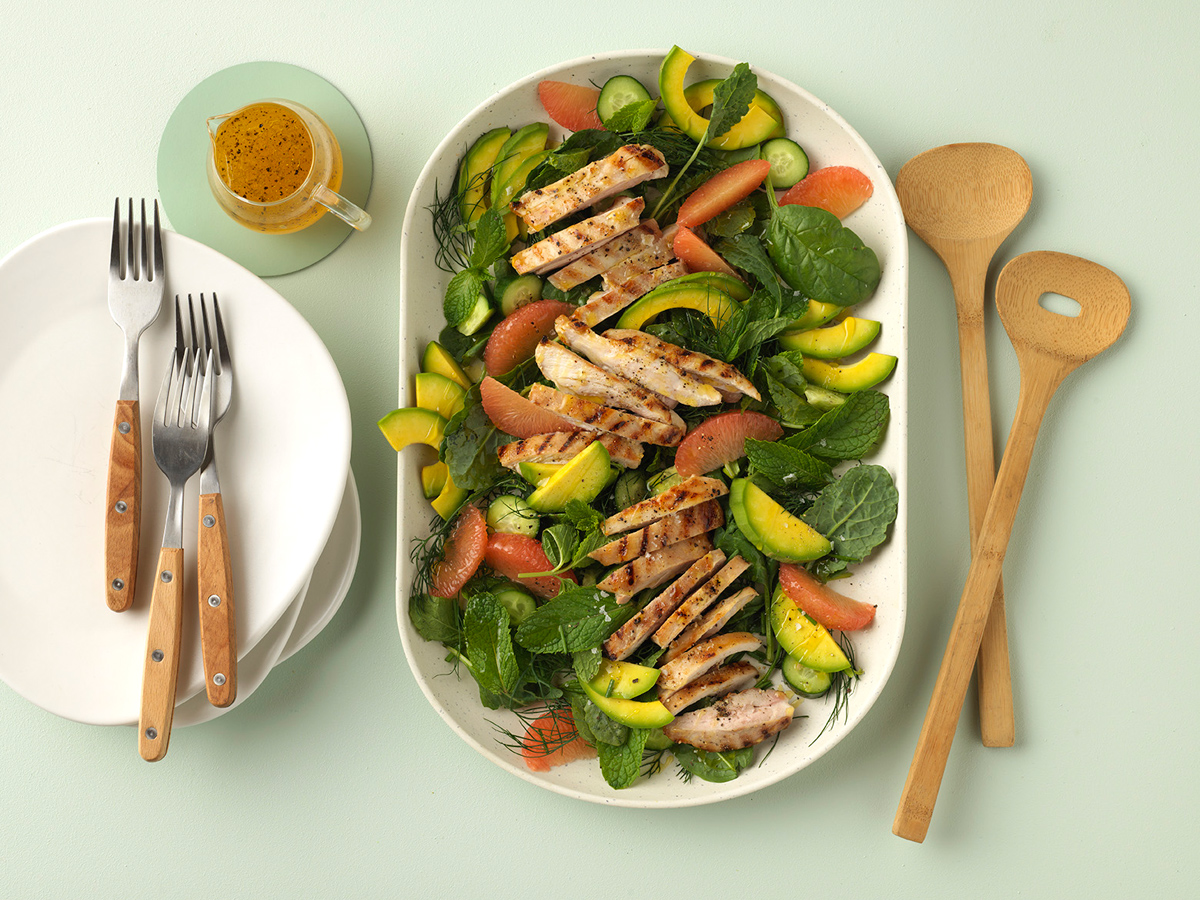 Avocado, grilled chicken and pink grapefruit salad