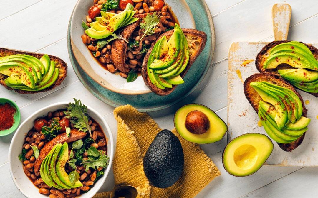 Chorizo, Kale and White Bean Braise with Avocado Crostini 