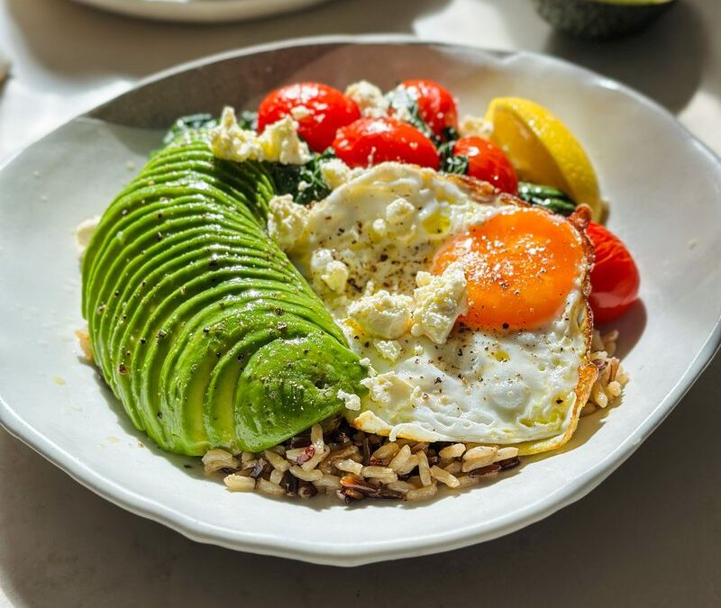 Breakfast Grain Bowl with Avocado, Feta, Crispy Fried Egg and Greens x Tom Walton